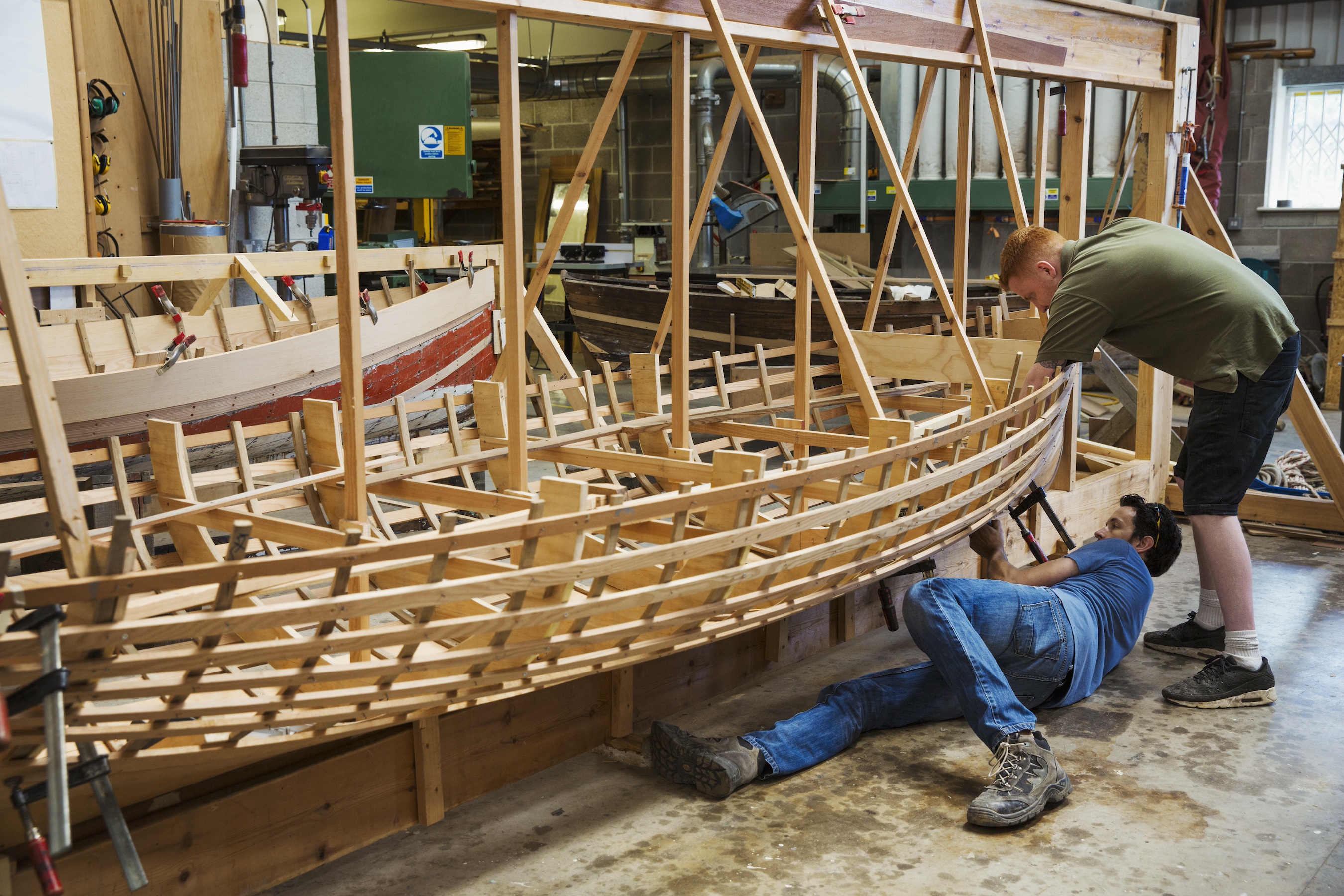 TwoMenBoatBuildingWorkshop